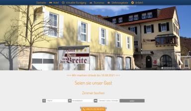 Screenshot Startseite Hotel Garni in der Breite mit Aueßnansicht des Gebäudes